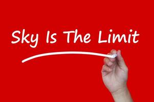 Sky is the limit motivational or inspirational quote text on red cover background. Conceptual photo