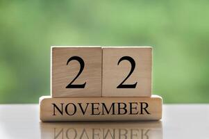 November 22 calendar date text on wooden blocks with copy space for ideas or text. Copy space photo