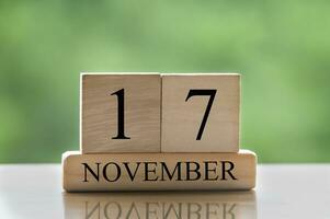 November 17 calendar date text on wooden blocks with copy space for ideas or text.