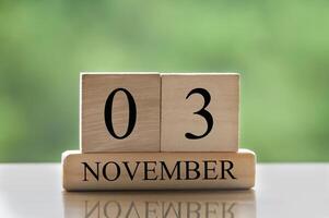 November 3 calendar date text on wooden blocks with copy space for ideas or text. Copy space