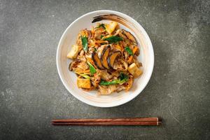 stir-fried noodles with tofu and vegetables photo