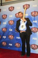 LAS VEGAS, DEC 10 - Randy Houser at the 2013 American Country Awards Press Room at Mandalay Bay Events Center on December 10, 2013 in Las Vegas, NV photo