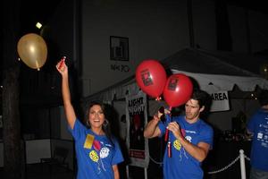 LOS ANGELES, OCT 1 -  Nadia Bjorlin, Brandon Beemer arriving at the Light The Night Hollywood Walk 2011 at the Sunset Gower Studios on October 1, 2011 in Los Angeles, CA photo