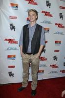 LOS ANGELES, FEB 15 - Kenton Duty arrives at the RADIO REBEL Telefilm Premiere at the AMC CityWalk Stadium 19 on February 15, 2012 in Los Angeles, CA photo