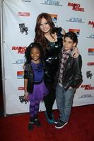 LOS ANGELES, FEB 15 - Cameron Boyce, Skai Jackson, Debby Ryan arrives at the RADIO REBEL Telefilm Premiere at the AMC CityWalk Stadium 19 on February 15, 2012 in Los Angeles, CA photo