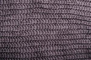 Black and gray knitted silk thread pattern for background. photo