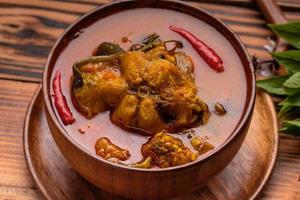 Catfish Curry. Thai food on dark background. Traditional food concept. Top View, Flat Lay, Copy Space photo