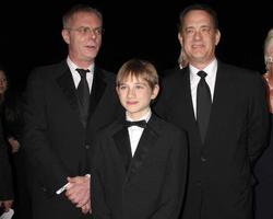 LOS ANGELES, JAN 7 - Stephen Daldry, Thomas Horn, Tom Hanks arrives at the 2012 Palm Springs International Film Festival Gala at Palm Springs Convention Center on January 7, 2012 in Palm Springs, CA photo