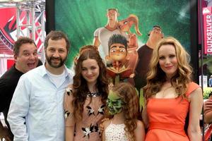 LOS ANGELES, AUG 5 - Jeff Garlin PHOTOBOMB with Judd Apatow, Maude Apatow, Iris Apatow, Leslie Mann arrives at the ParaNorman Premiere at Universal CityWalk on August 5, 2012 in Universal City, CA photo