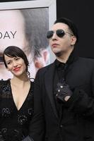 LOS ANGELES, APR 10 -  Lindsay Usich, Marilyn Manson at the Transcendence Premiere at Village Theater on April 10, 2014 in Westwood, CA photo