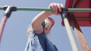 Little blonde girl on playground video
