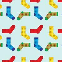 Pattern with socks of different textures and colors. Background of winter fashion items of clothing vector