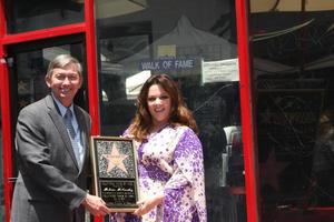 LOS ANGELES, MAY 19 - Leron Gubler, Melissa McCarthy at the Melissa McCarthy Hollywood Walk of Fame Ceremony at the TCL Chinese Theater on May 19, 2015 in Los Angeles, CA photo