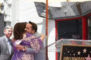 LOS ANGELES, MAY 19 - Ben Falcone, Melissa McCarthy at the Melissa McCarthy Hollywood Walk of Fame Ceremony at the TCL Chinese Theater on May 19, 2015 in Los Angeles, CA photo