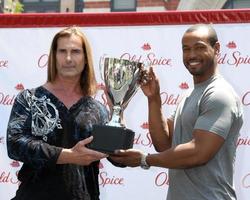 LOS ANGELES, JUL 28 - Fabio, Isaiah Mustafa at a public appearance to promote the Epic Old Spice Challenge at The Grove on July 28, 2011 in Los Angeles, CA photo