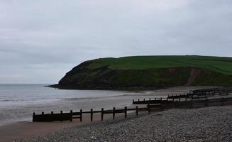 St Bees Beach and Green Sea Cliffs in England photo