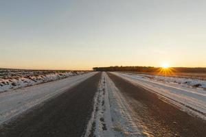 snow covered road photo