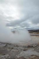 Breathtaking Geyser Known as Strokkur After It Blows photo