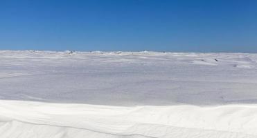 Deep snowdriftscylindrical stacks photo