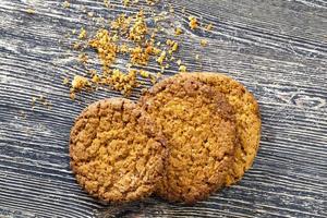 crumbs round shaped oatmeal cookies photo