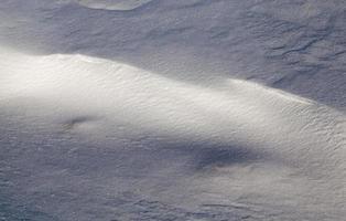 Large snowdrifts, close up photo