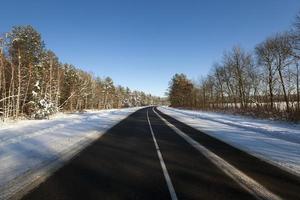 Snow covered road photo