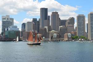 Large Red Sailboat in Boston Harbor in the Summer photo