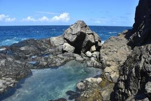 Shallow Tidal Natural Pool Along the Coast of Aruba photo