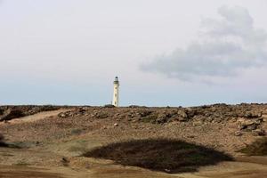 California Lighthouse in Aruba Off in the Distance photo