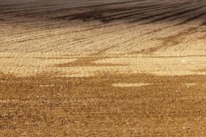 plowed soil field photo