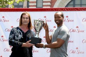 LOS ANGELES, JUL 28 - Fabio, Isaiah Mustafa at a public appearance to promote the Epic Old Spice Challenge at The Grove on July 28, 2011 in Los Angeles, CA photo