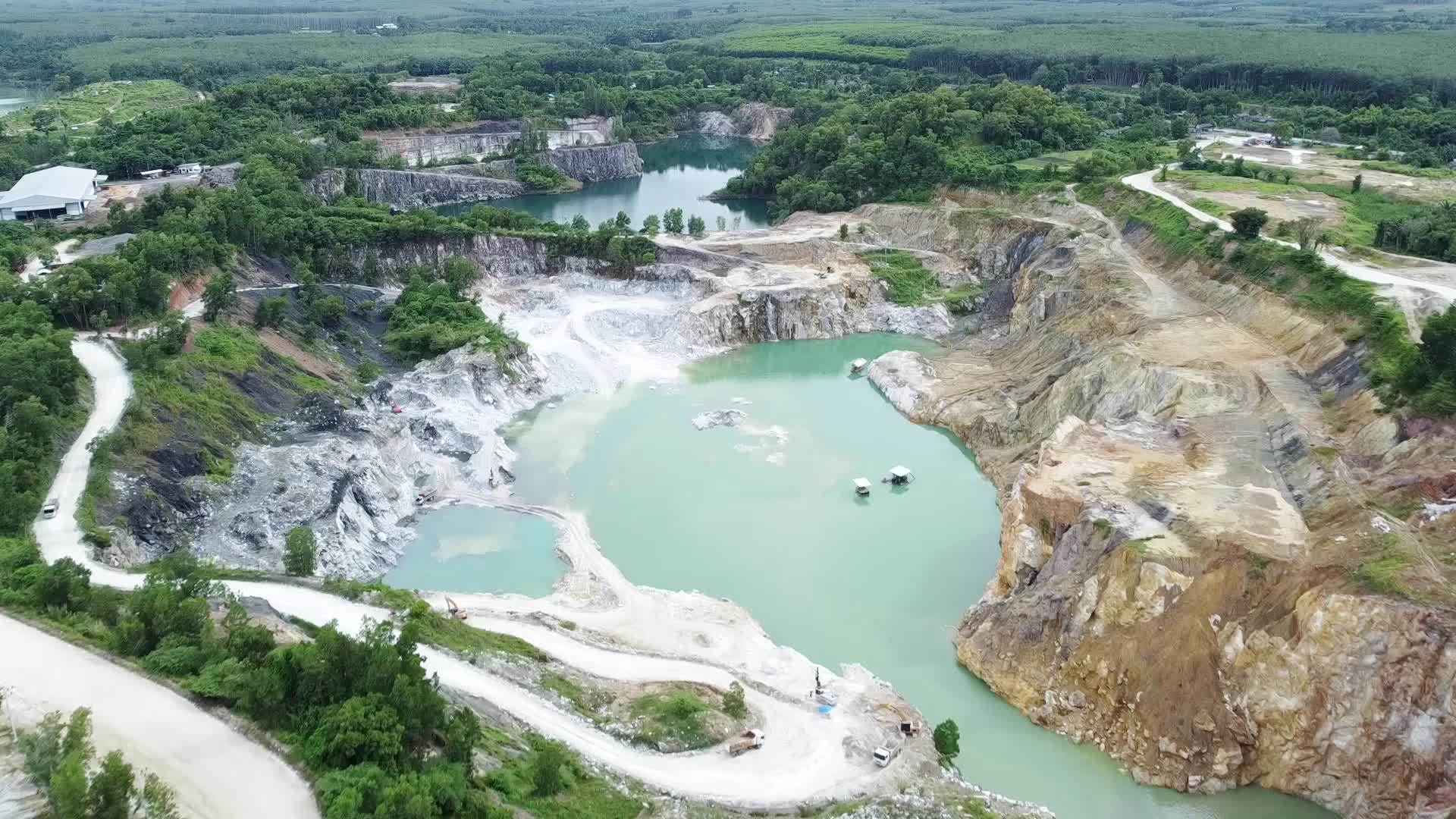 aerial photograph of a large pit of a gypsum mine. A large gypsum mine