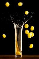 Fine wine and grapes falling photo