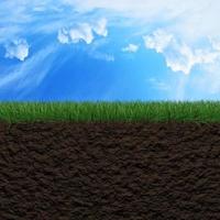 Grass, soil and sky background photo