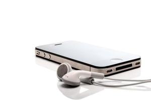 Iphone 4S and earphones photo