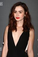 LOS ANGELES, FEB 19 -  Lily Collins arrives at the 15th Annual Costume Designers Guild Awards at the Beverly HIlton Hotel on February 19, 2013 in Beverly Hills, CA photo