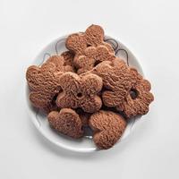 Chocolate cookies on dish photo