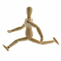 Running wooden manikin photo