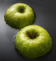Two apples on water photo