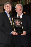 LOS ANGELES, MAR 16 - Leron Gubler, Malcolm McDowell at the Malcolm McDowell Walk of Fame Star Ceremony for The Muppets at the Hollywood Boulevard on March 16, 2012 in Los Angeles, CA photo