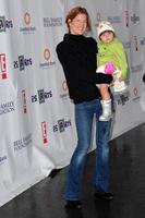 LOS ANGELES, NOV 20 - Michelle Stafford and daughter arrives at the P S Arts 2011 Express Yourself Event at Barker Hanger on November 20, 2011 in Santa Monica, CA photo