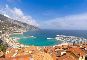 Scenic panoramic view of Menton seashore promenade and historic city in French Riviera Cote D azur photo