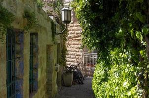 Israel, Jerusalem old narrow streets of Nahlaot historic neighborhood with many small synagogues photo