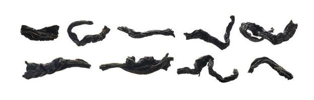 A set of dried black tea. Isolated on a white background photo