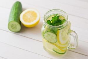 Detox water with lemon and cucumber photo