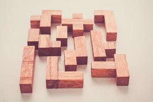 Different shapes wooden blocks on white background photo
