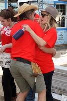 LOS ANGELES, OCT 25 - William H Macy, Kristen Bell at the Habitat for Humanity build by Showtime s House of Lies and Shameless at Magnolia Blvd on October 25, 2014 in Lynwood, CA photo