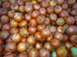 Defocused abstrack background of fresh fruits on display rack photo