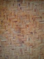 Defocused abstract background of woven bamboo crafts photo