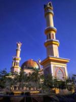 Defocused abstract background of mosque dome and minarets photo